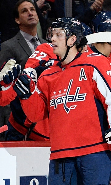Carlson leads Caps to first home win, 4-3 over Maple Leafs